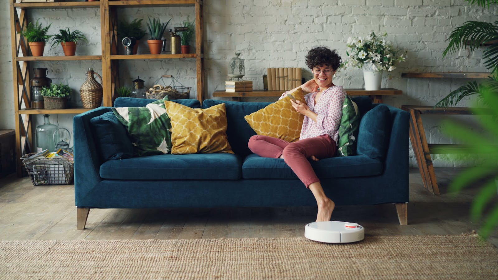 Smart home living room with a robot vacuum and connected devices